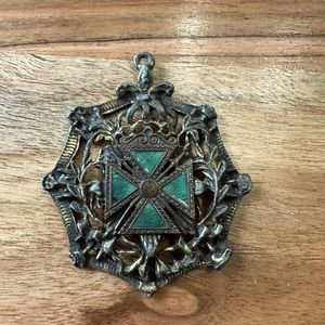 Vintage antique pendant with green enamel inlay